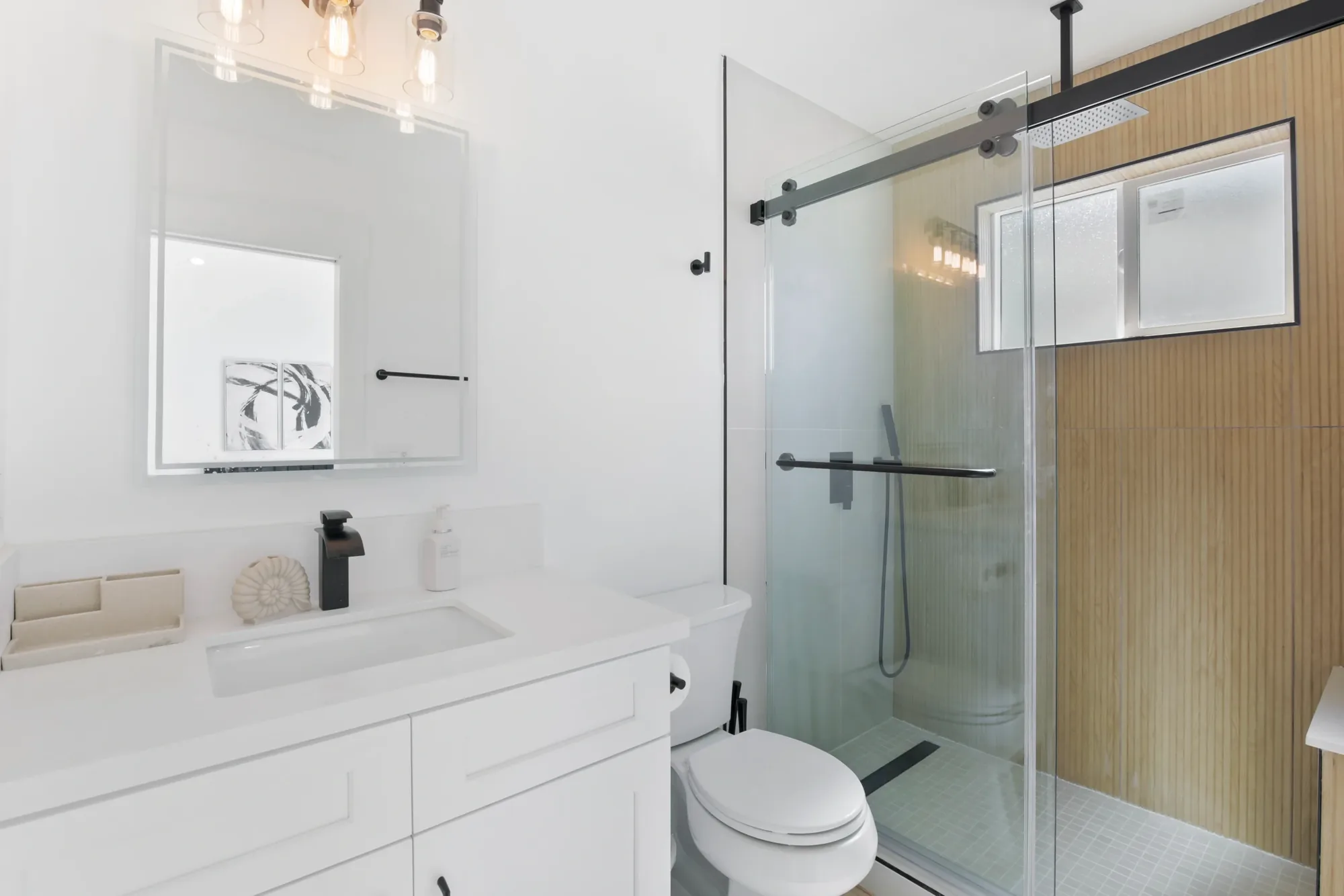 ADU bathroom with walk-in glass shower