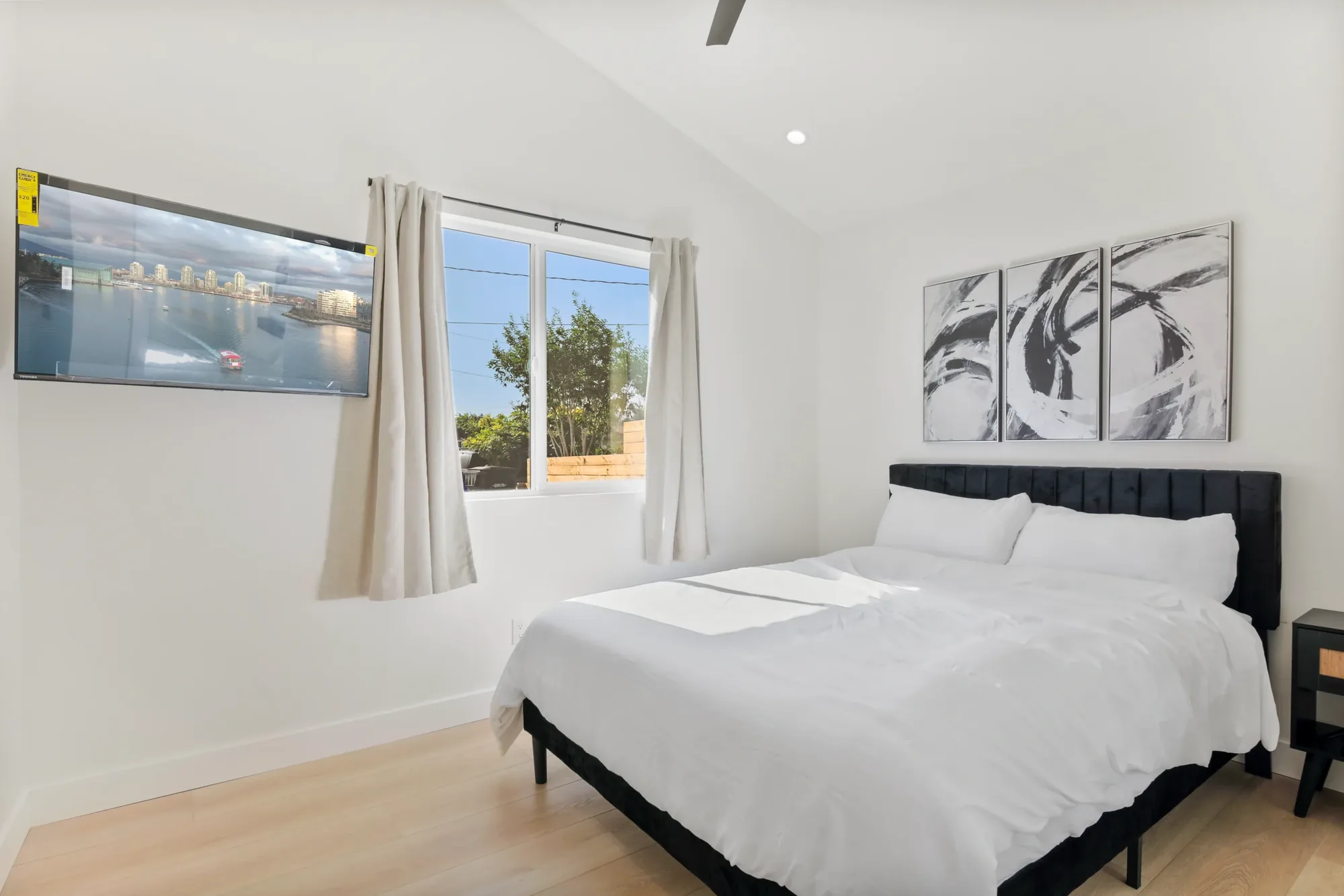 ADU bedroom with large windows