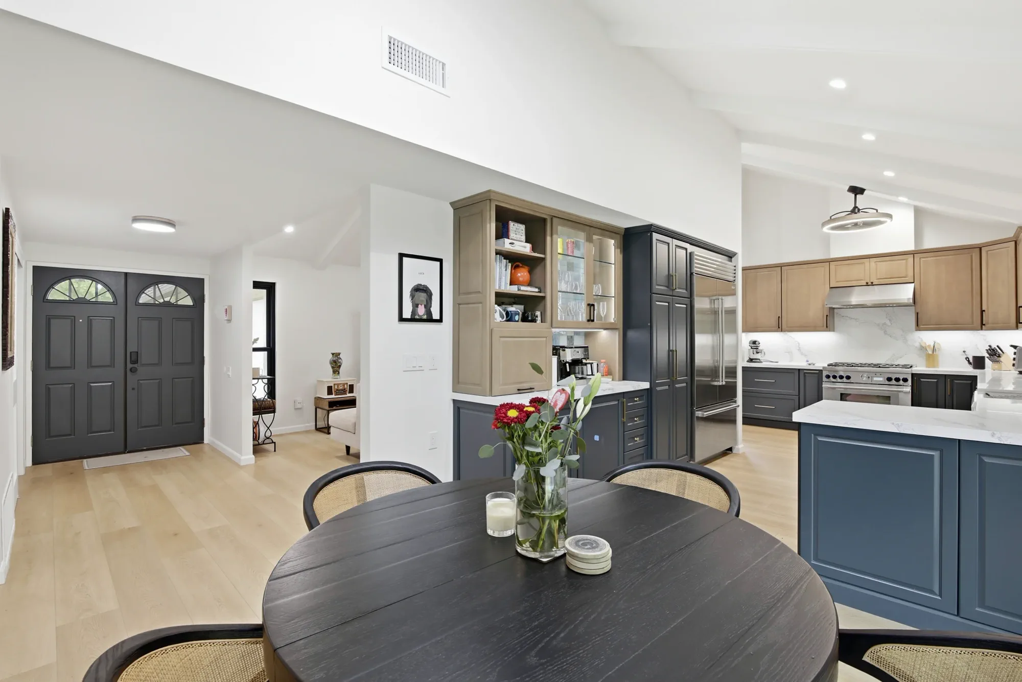 Remodeled entry and dining area open to the kitchen