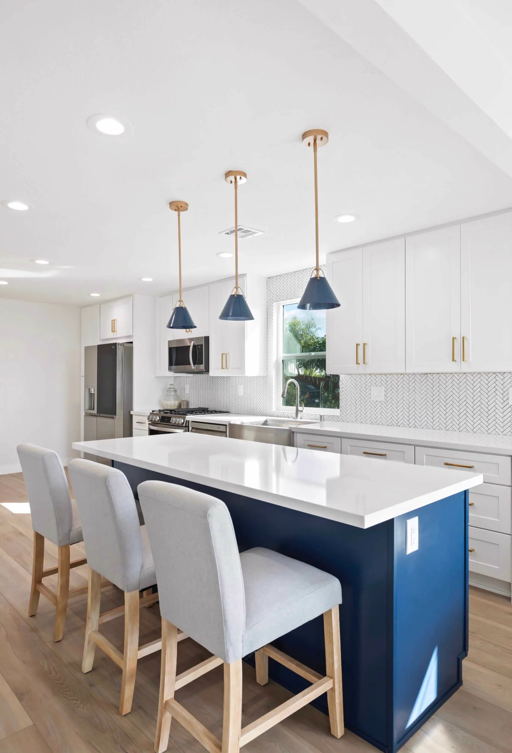 White and navy kitchen remodel with gold hardware, La Mesa