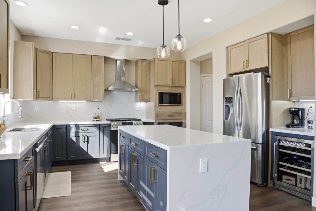 Kitchen remodeling in Linda Vista San Diego with navy cabinets and quartz island by Elements Design & Build